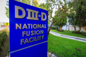 A blue sign reads "DIII-D National Fusion Facility"